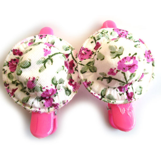 Rosa Haarspangen mit Hüten mit grün-rosa Blumenmotiv